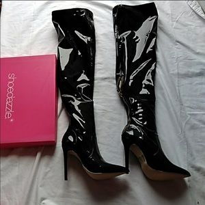 Over the knee black leather boots